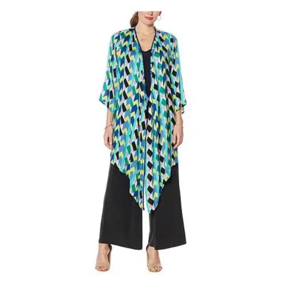 Curations Green-Geo printed Topper / Cardigan featuring a Stylish Shark Bite Hem